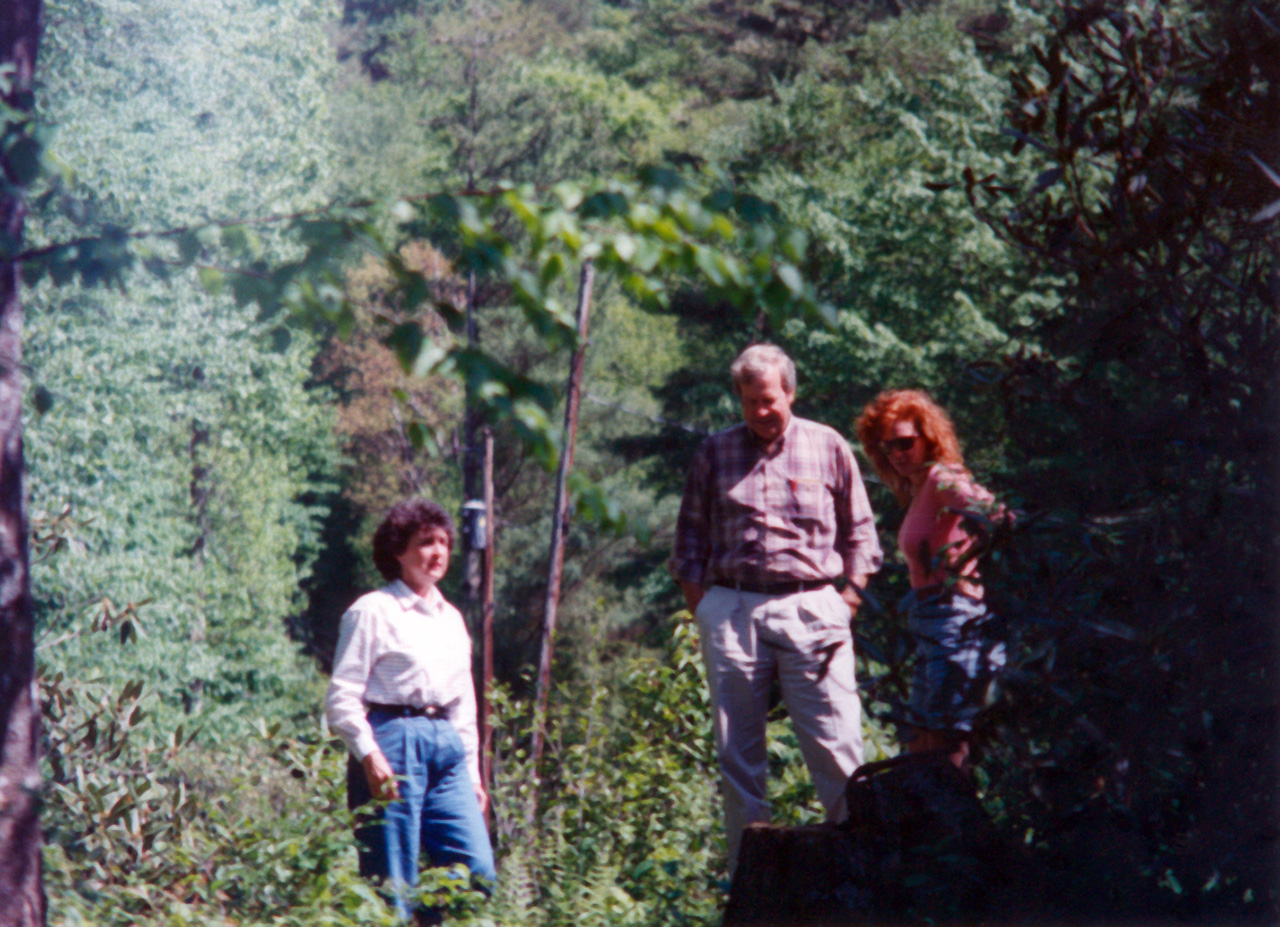 Ginny and Bill describing the future home site on Rocky Creek Road in May, 1994.